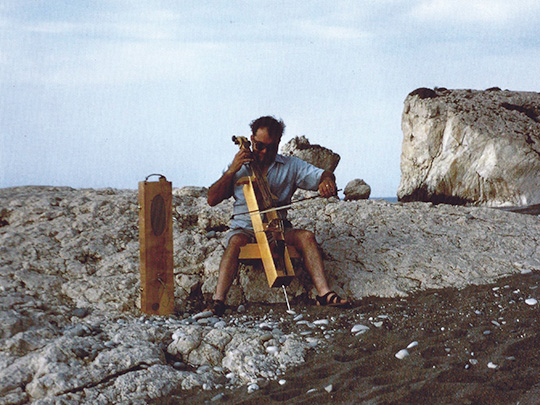Eldridge playing the cello on Cyprus.