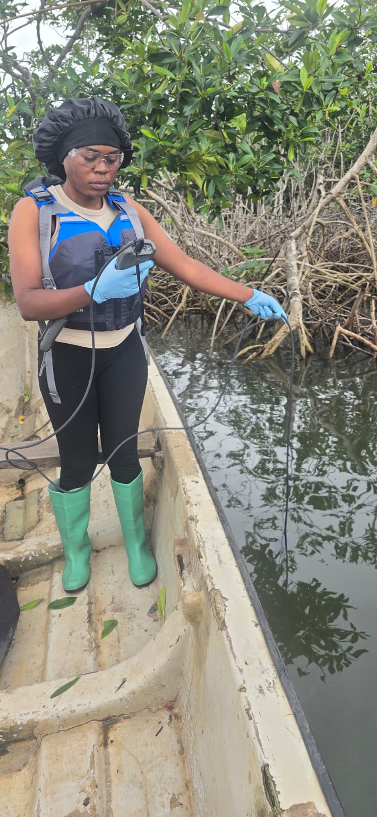 Claris working along the water