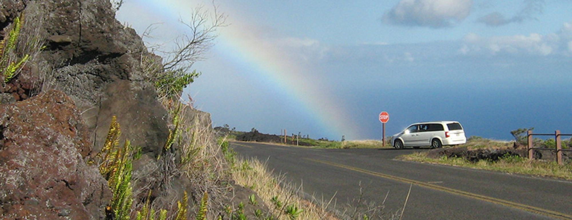 Van under rainbow