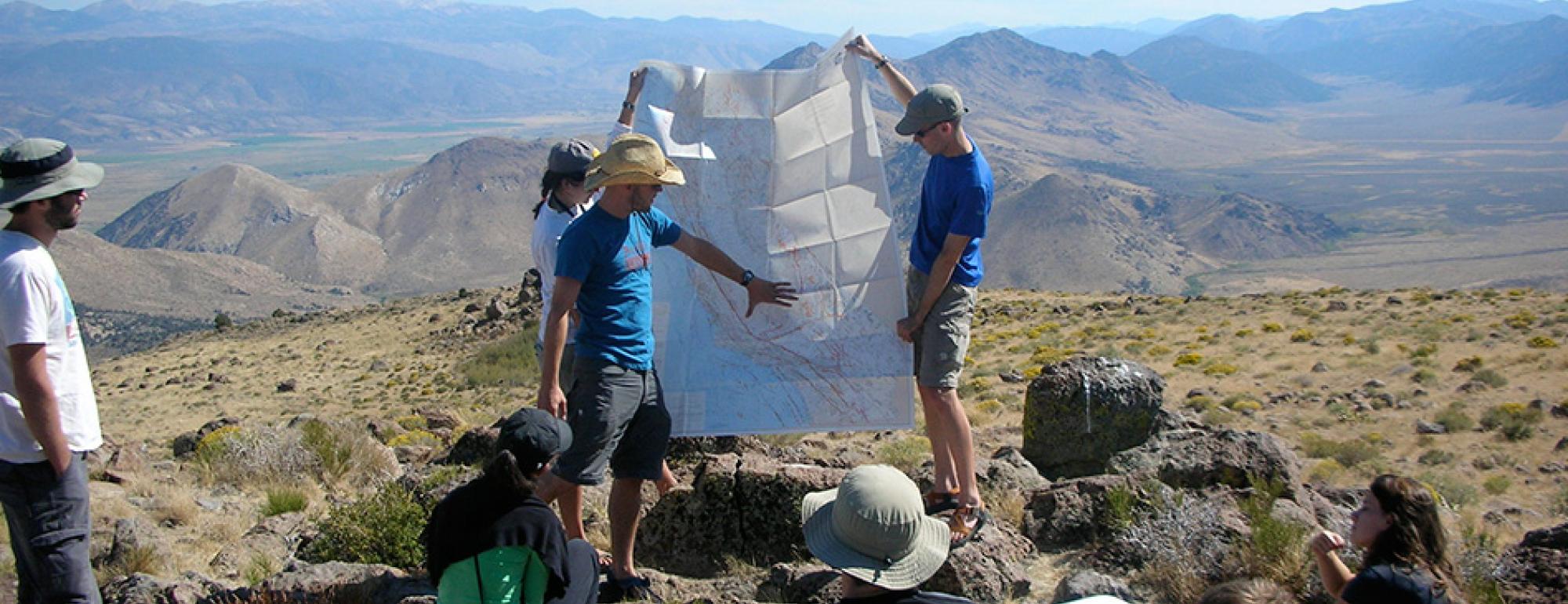 grad students with map