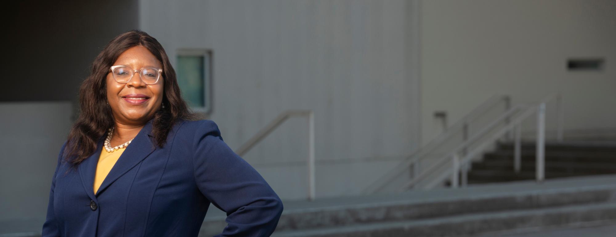 Estella Atekwana, the dean of the College of Letters and Science, stands in front of the college on November 22, 2021.