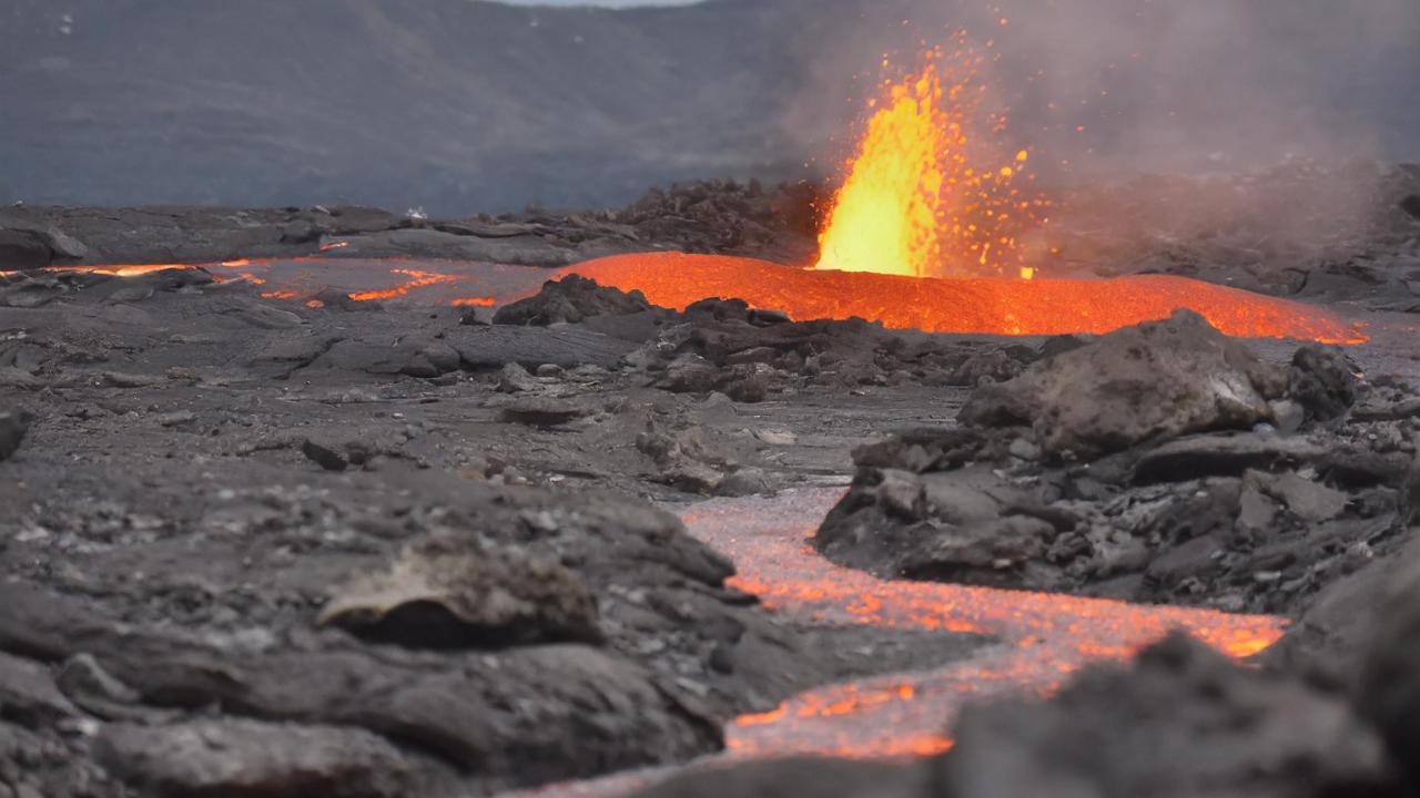 Magma flows out of the ground