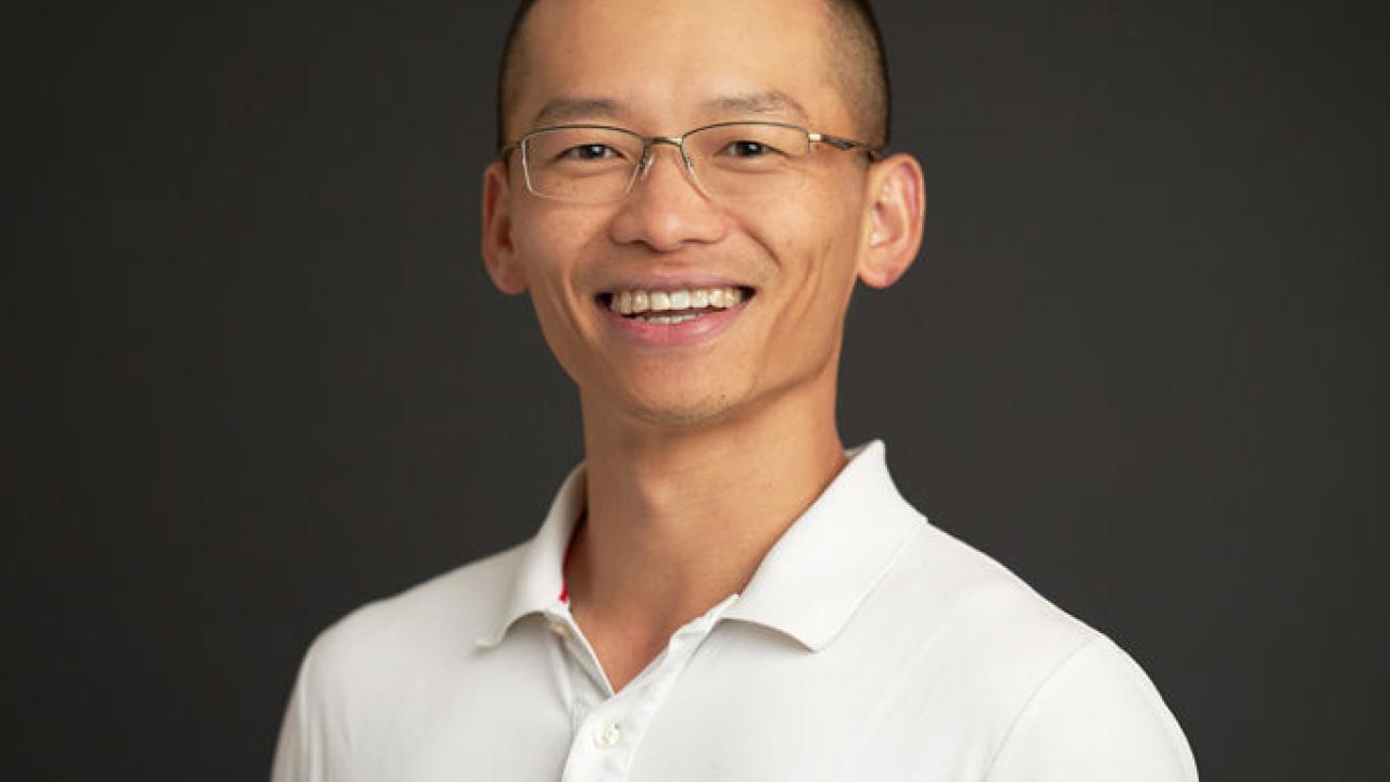 A headshot of Dr. Xiaochuan Tian